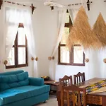 Kima Serviced Beach House & Suites