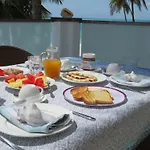 Deluxe Beachfront Penthouse With Panoramic Ocean Views