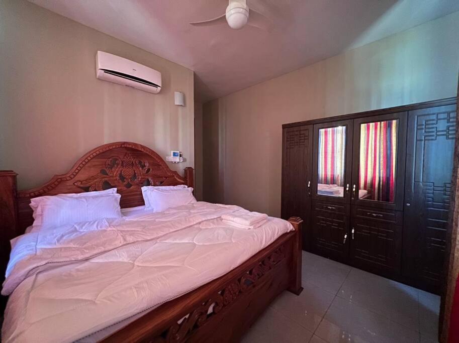 Minimalistic And Crisp In Mbweni Apartment *